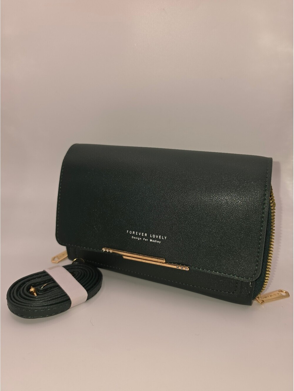 Elegant Green Crossbody Bag with Multiple Zippered Compartments and Detachable